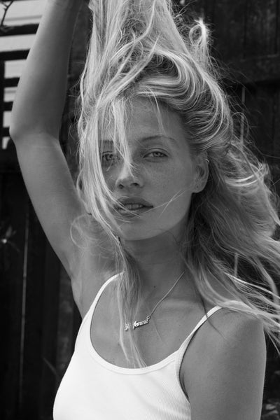 Jeet wears Par Femme singlet and necklace